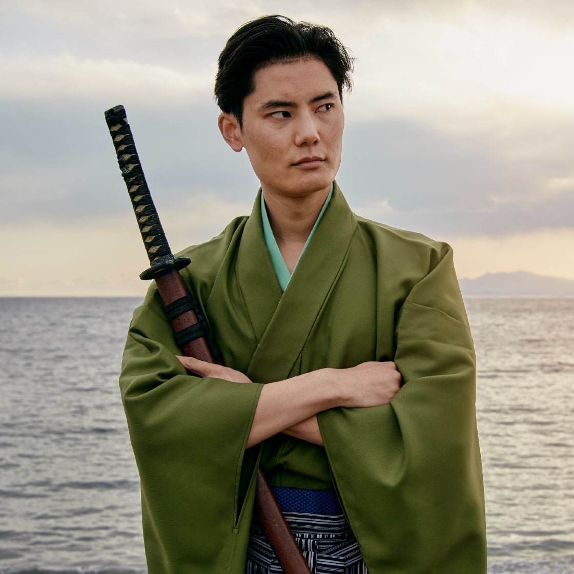 Samurai in a kimono carrying a katana